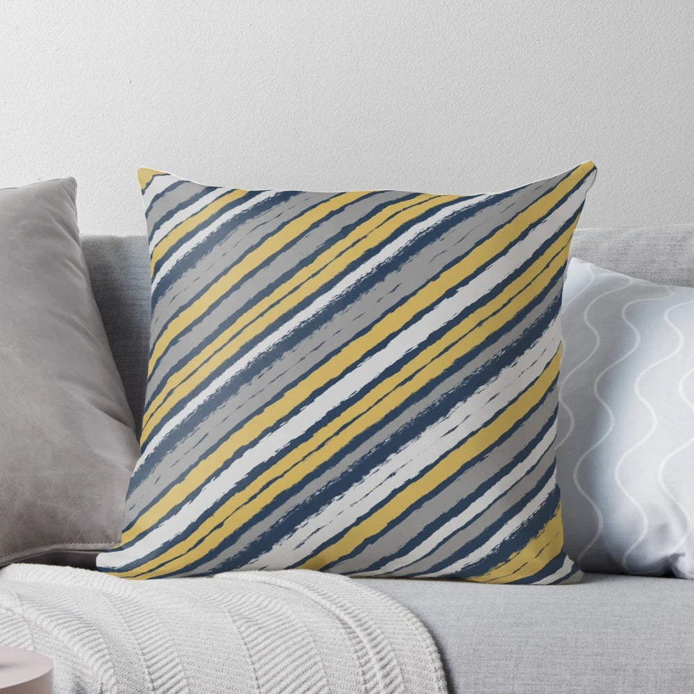 Grey, mustard yellow, and blue brush stroke striped pillow