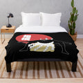 Plush blanket featuring a sumo wrestler design with Japanese art