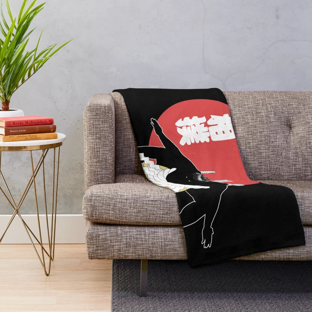 Plush blanket featuring a sumo wrestler design with Japanese art