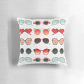 Red and mint colored decorative throw pillow with a sunglasses illustration design