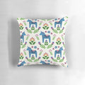 A vibrant blue Dala horse pillow, a classic symbol of Swedish folk art and Scandinavian design.