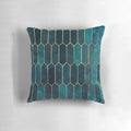 Teal and gold geometric patterned decorative pillow