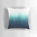 Teal and charcoal ombre decorative throw pillow with a minimalist, ocean-inspired design