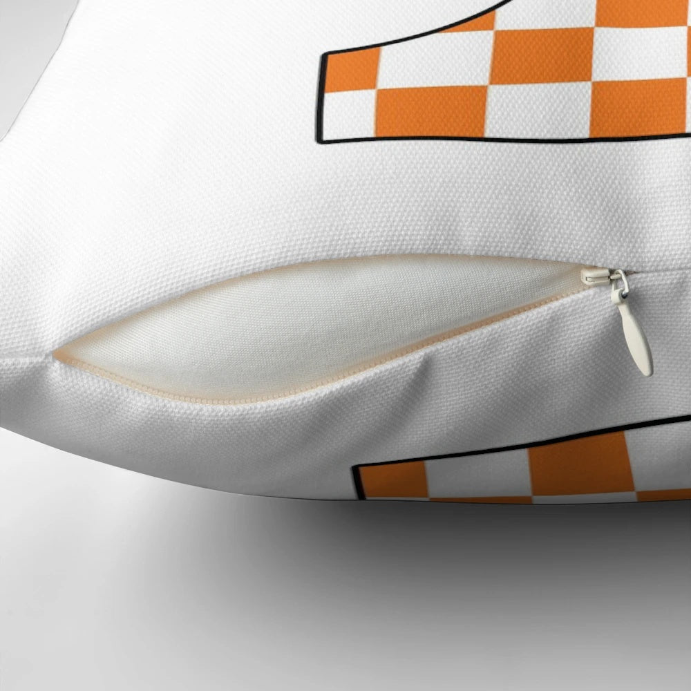 Soft, comfortable pillow featuring a stylish Tennessee-inspired checkerboard design
