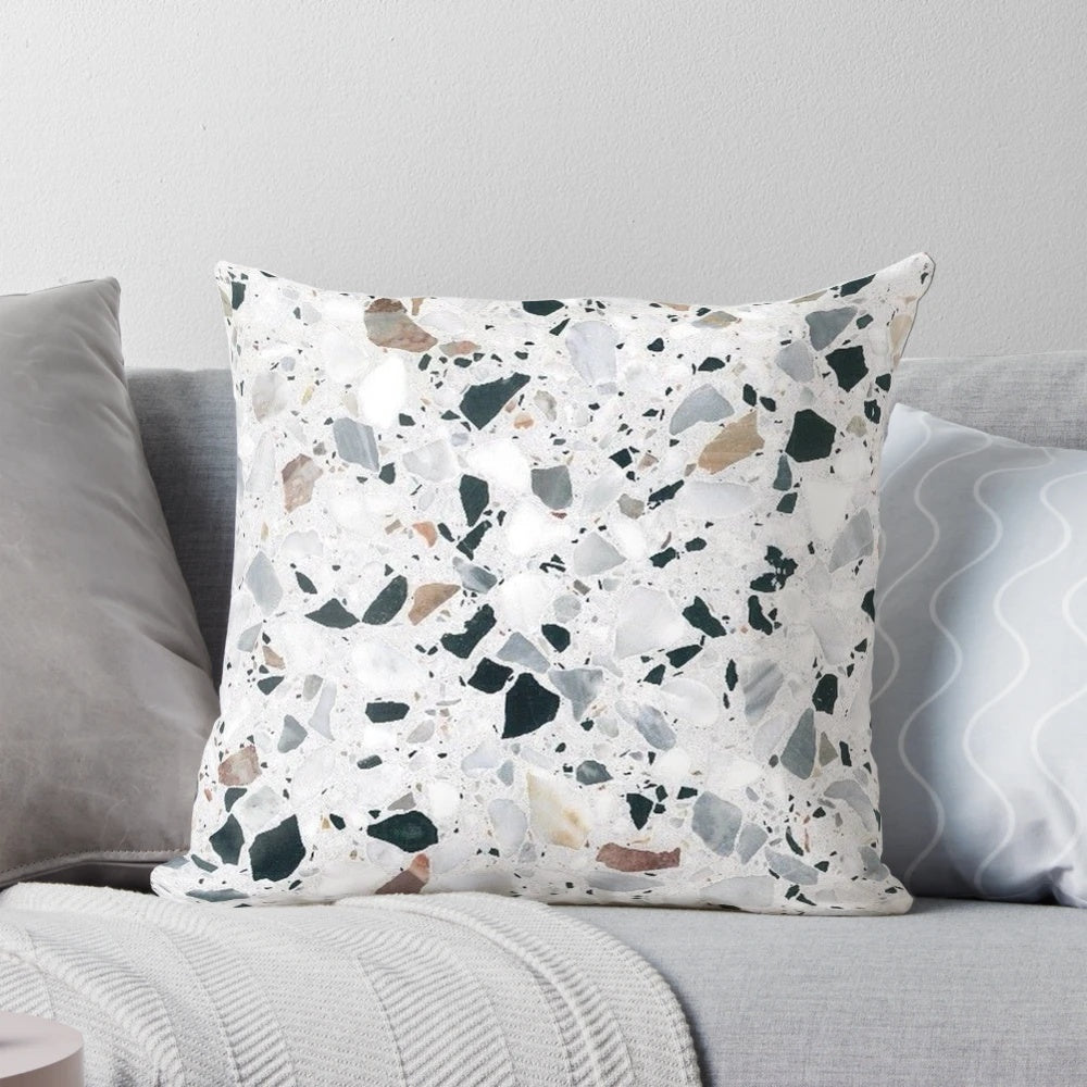 Terrazzo pattern decorative pillow in black, white, grey and bronze colors