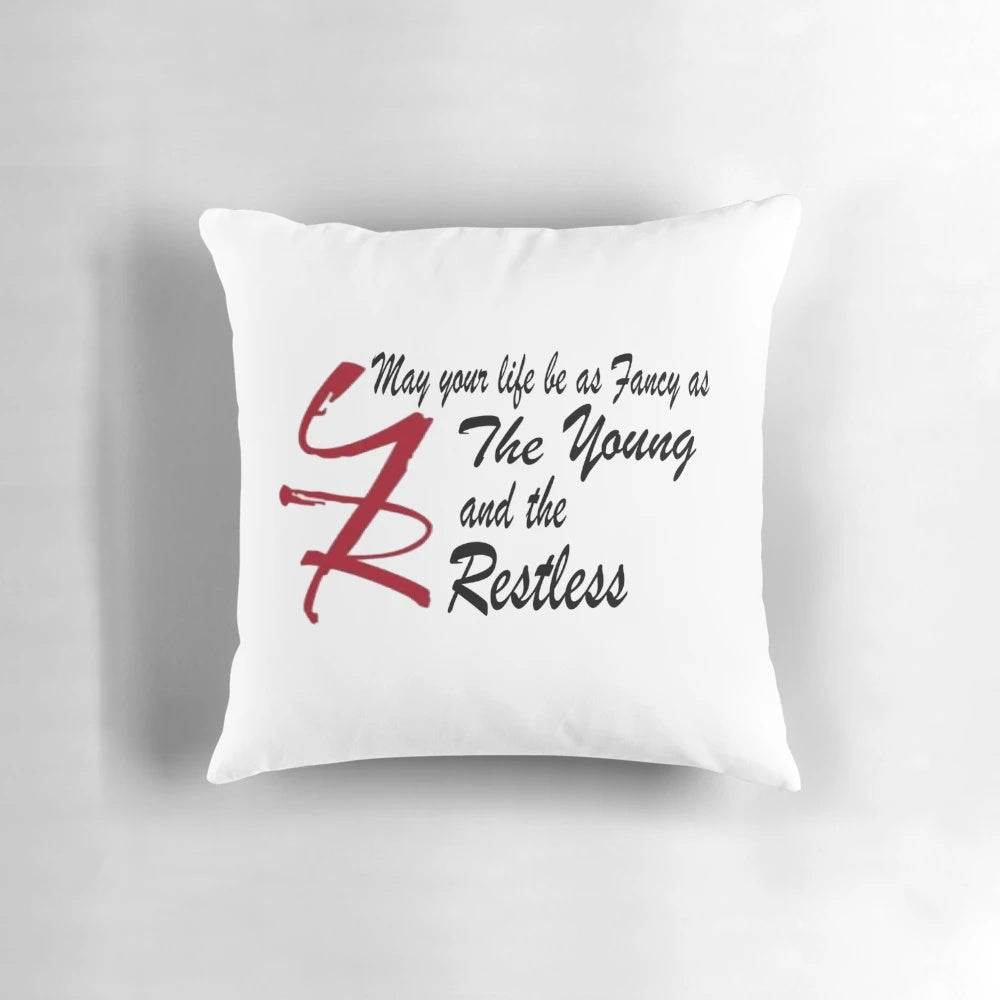 The Young and the Restless themed decorative pillow with characters from the popular soap opera