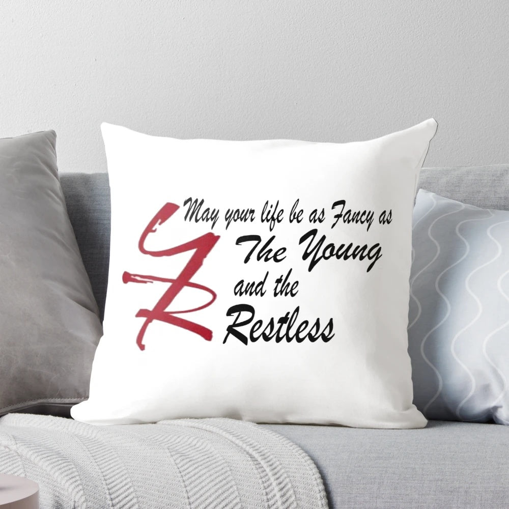 The Young and the Restless themed decorative pillow with characters from the popular soap opera