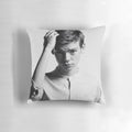 Decorative throw pillow featuring a portrait of actor Thomas Brodie-Sangster