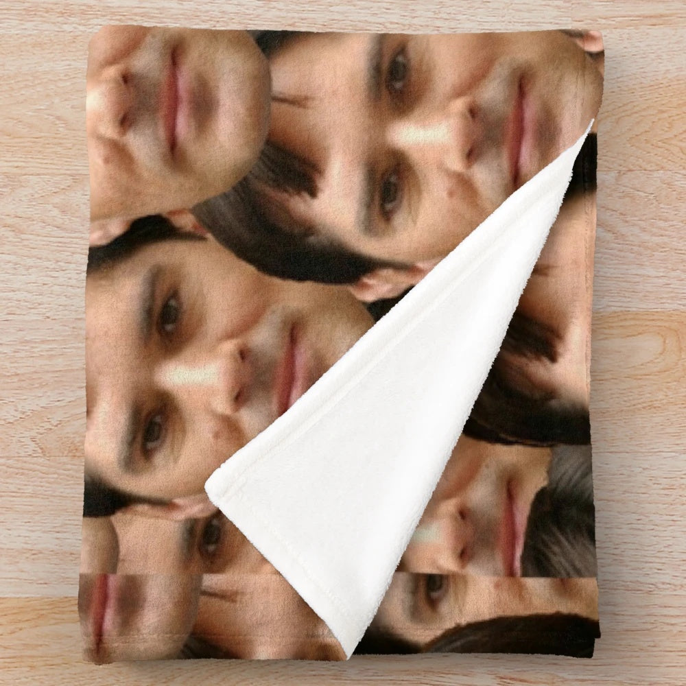 Cozy plush blanket featuring a detailed design of Thomas Gibson's head