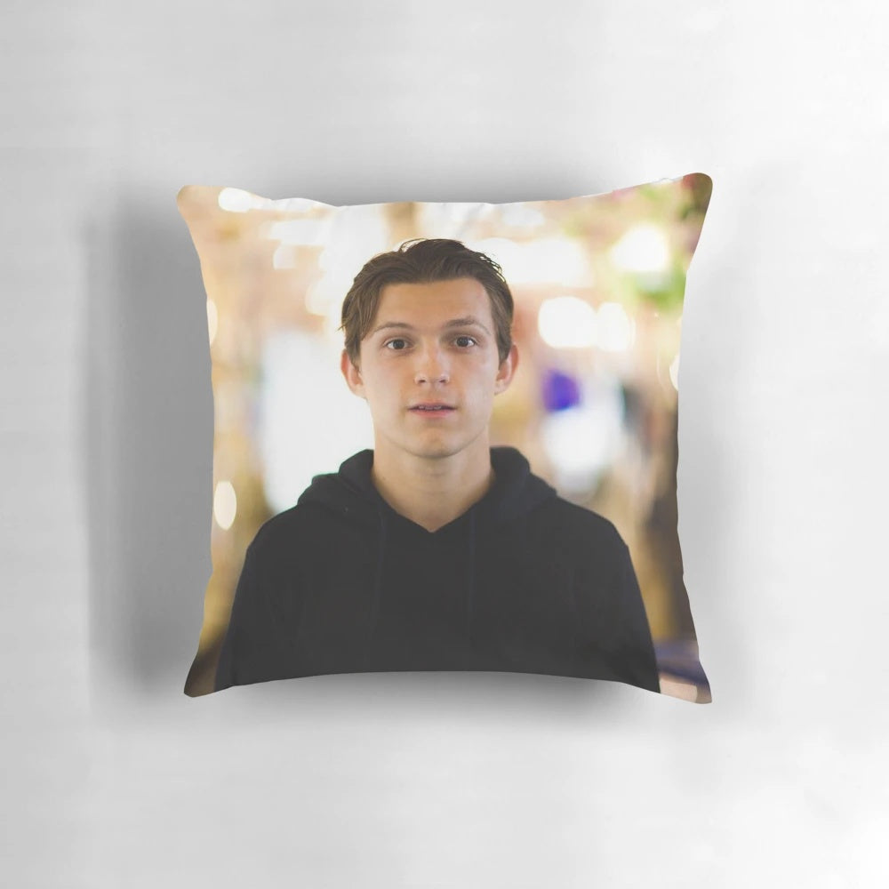 Soft, plush pillow featuring a design inspired by Marvel's Spiderman character Tom Holland