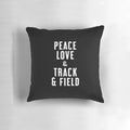 A navy blue pillow with a white graphic design featuring the words "Peace Love and Track & Field