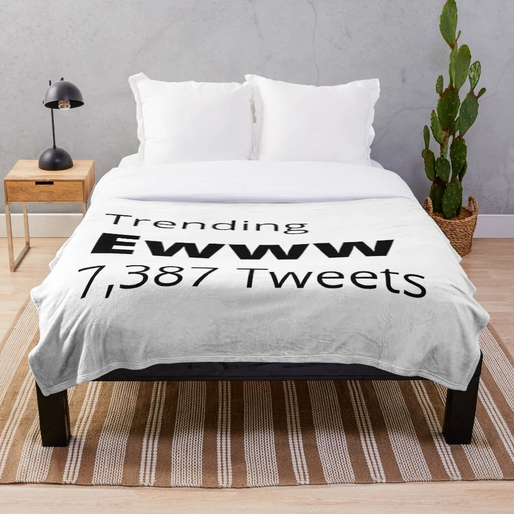 Stylish and trendy plush blanket featuring a unique graphic design