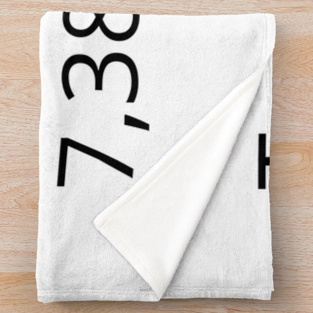 Stylish and trendy plush blanket featuring a unique graphic design