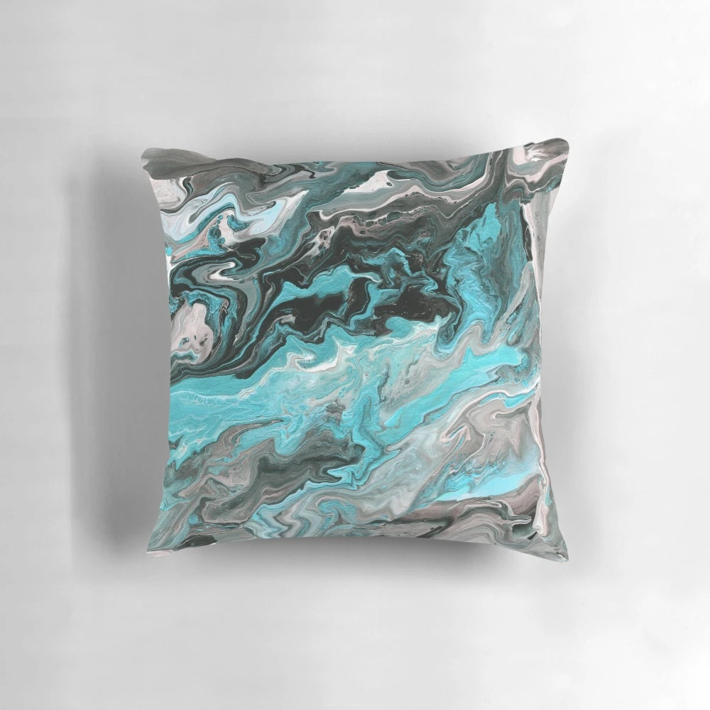 Turquoise marble-patterned pillow with a modern paint pour design