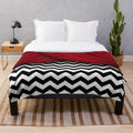 Cozy and stylish plush blanket featuring a black and white chevron design, inspired by the iconic TV series Twin Peaks.