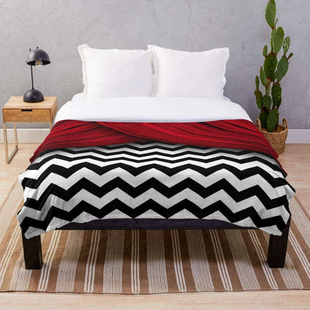 Cozy and stylish plush blanket featuring a black and white chevron design, inspired by the iconic TV series Twin Peaks.