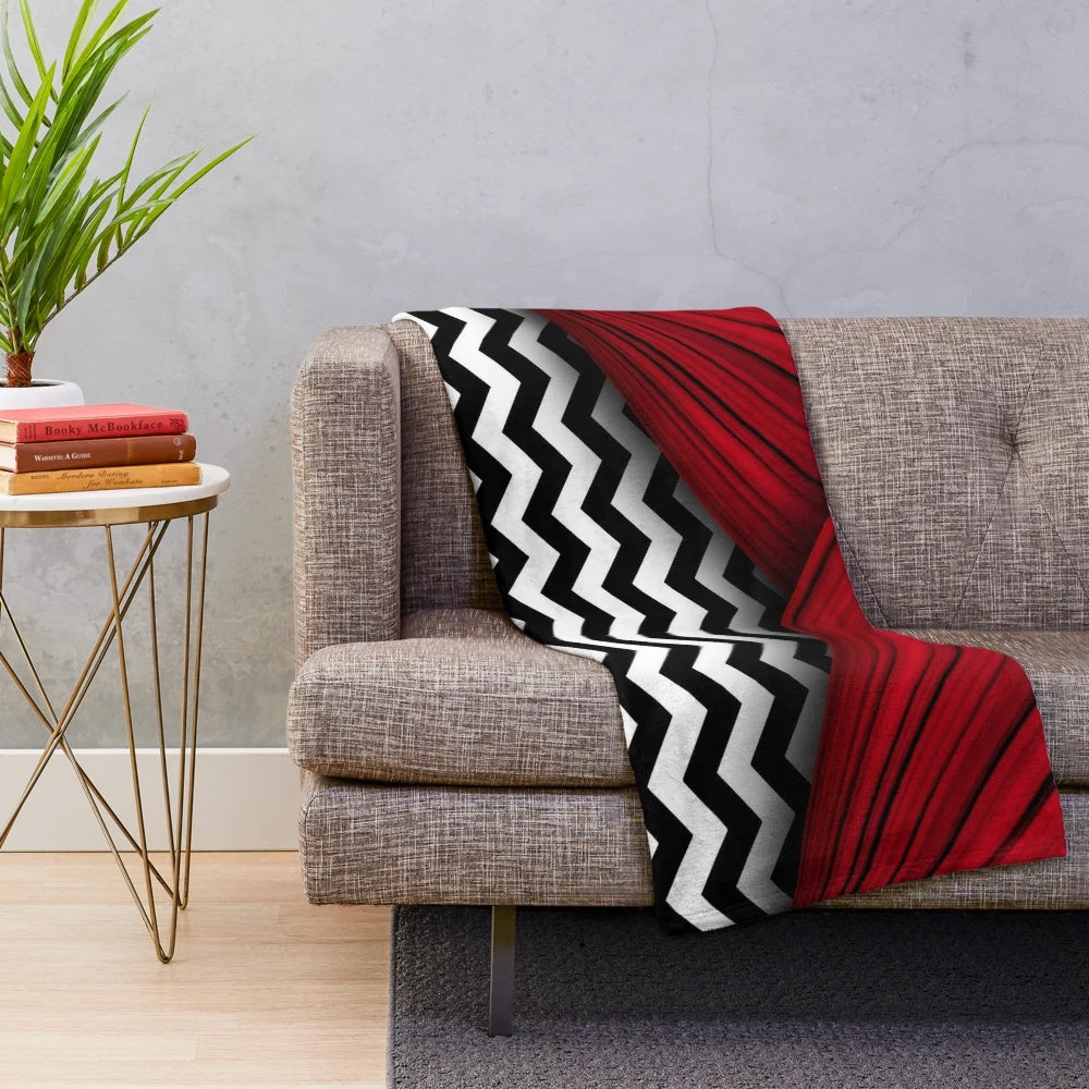 Cozy and stylish plush blanket featuring a black and white chevron design, inspired by the iconic TV series Twin Peaks.