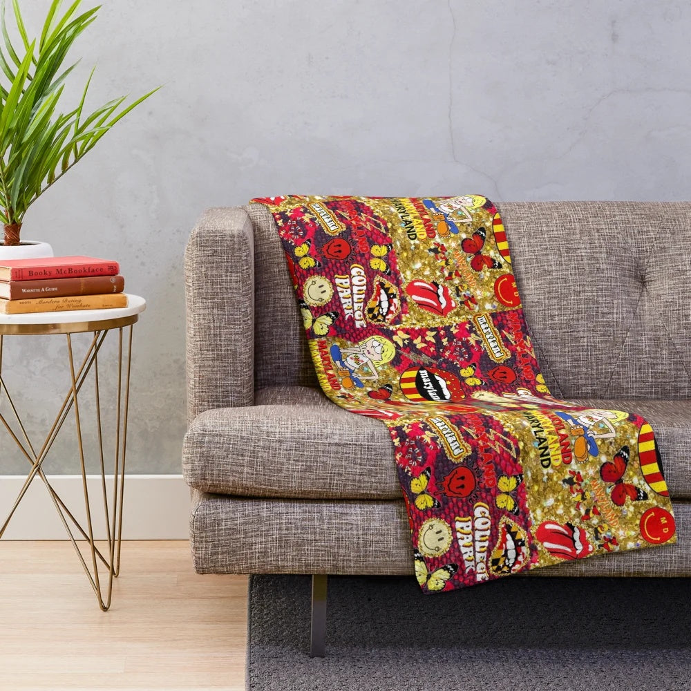 Cozy and trendy plush blanket featuring the University of Maryland logo and designs