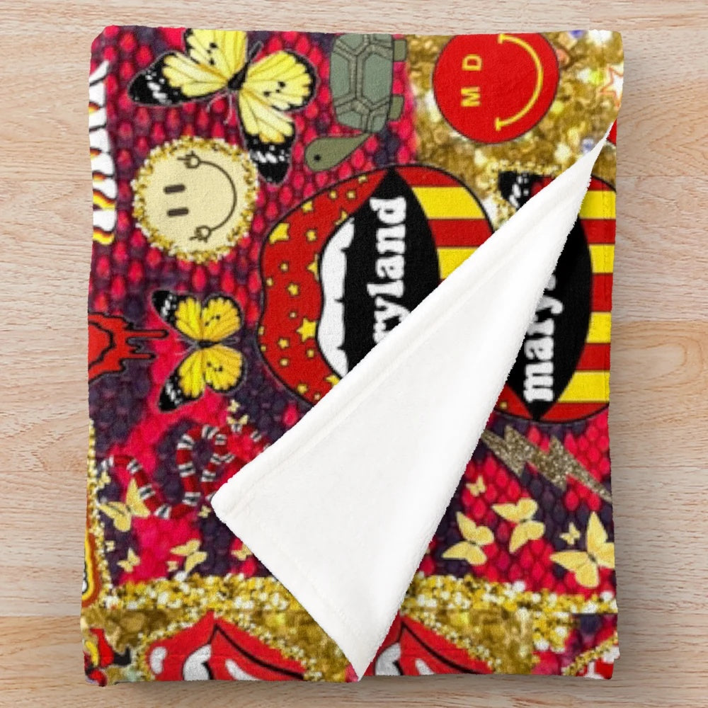 Cozy and trendy plush blanket featuring the University of Maryland logo and designs
