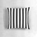 Vertical black and white striped pillow for modern home decor