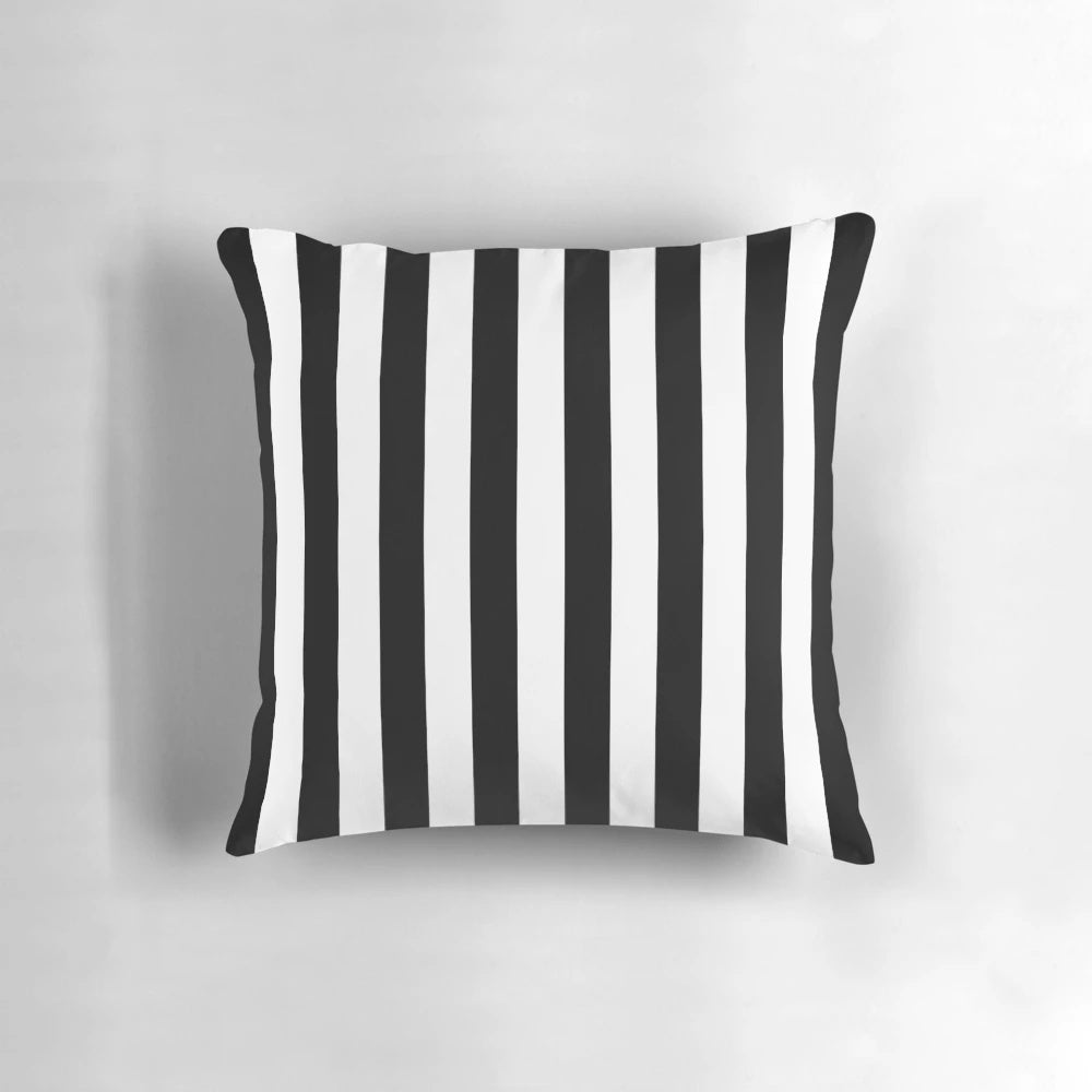 Vertical black and white striped pillow for modern home decor