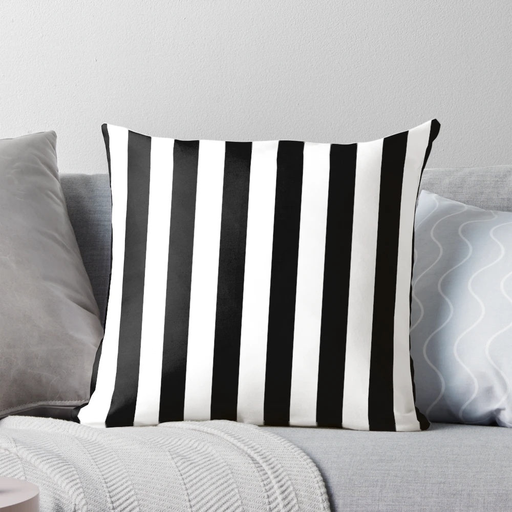 Vertical black and white striped pillow for modern home decor