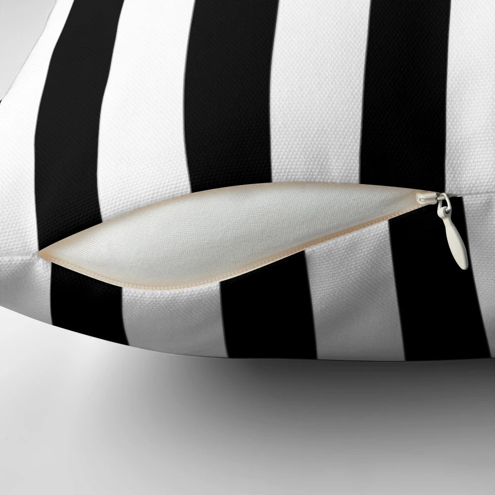 Vertical black and white striped pillow for modern home decor