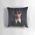 A cozy and chic pillow featuring the iconic character Wednesday Addams from The Addams Family.