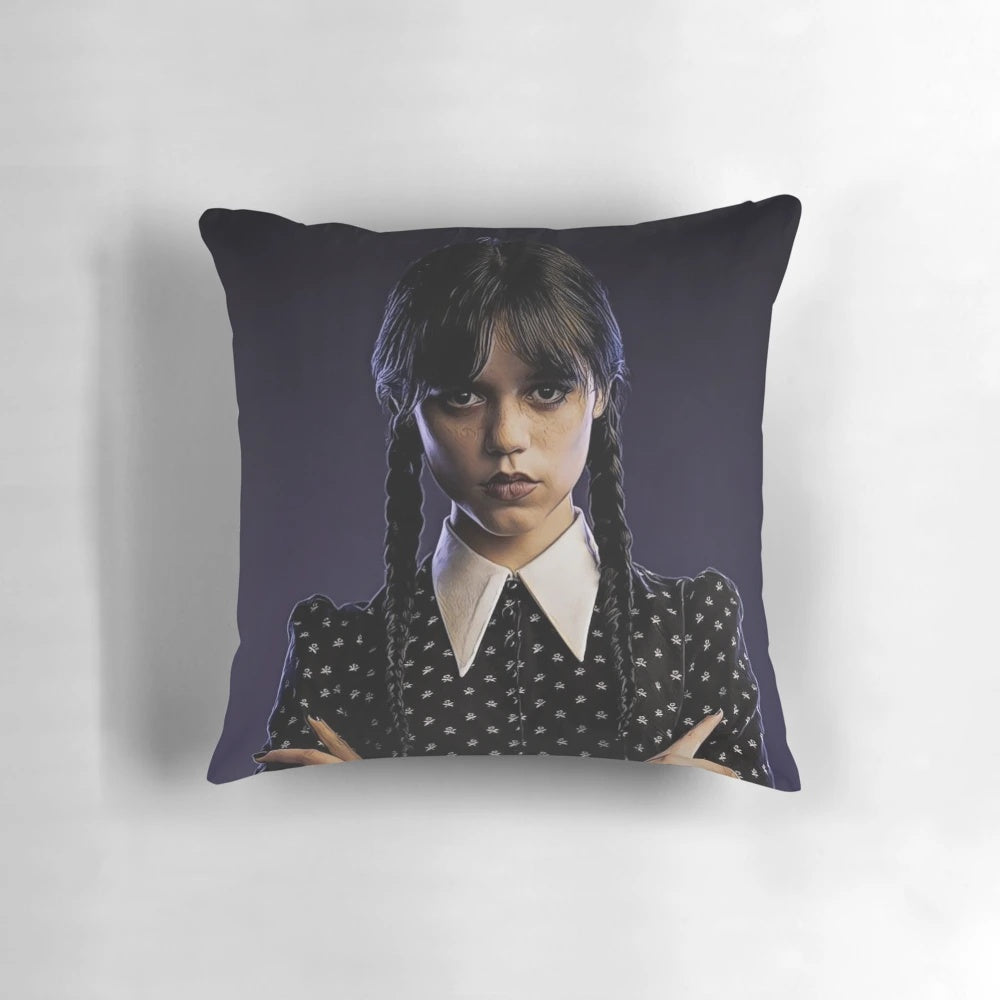 A cozy and chic pillow featuring the iconic character Wednesday Addams from The Addams Family.
