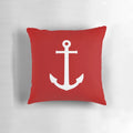 White anchor design on a medium red pillow, perfect for nautical and coastal home decor.