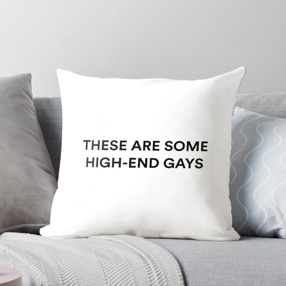 A white pillow cover featuring the quote "THESE ARE SOME HIGH-END GAYS" from the character Tanya in the TV show White Lotus.
