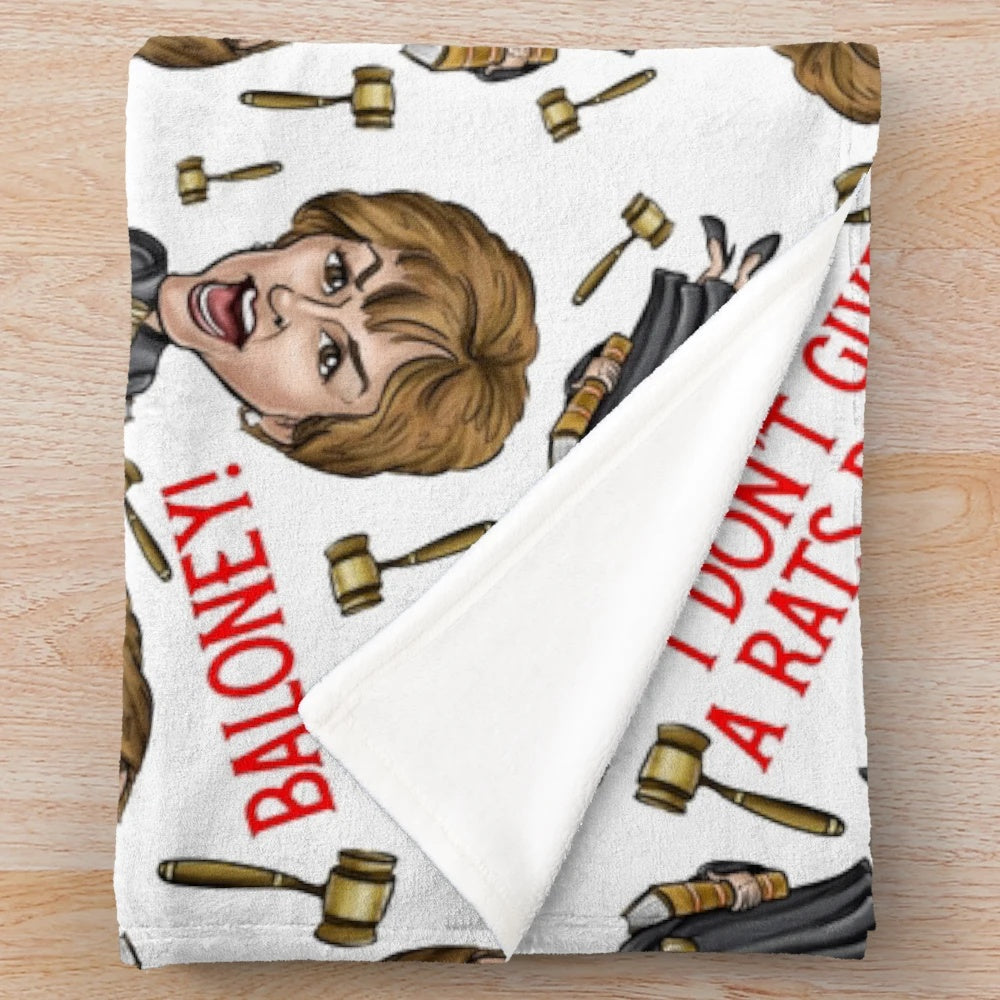 White plush blanket featuring a Judge Judy graphic design
