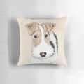 Closeup portrait of a cute wire fox terrier dog on a decorative pillow