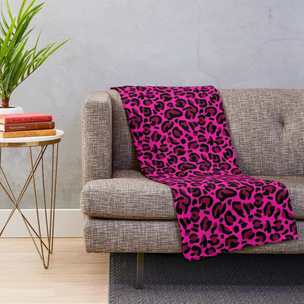Vibrant hot pink and leopard print plush blanket