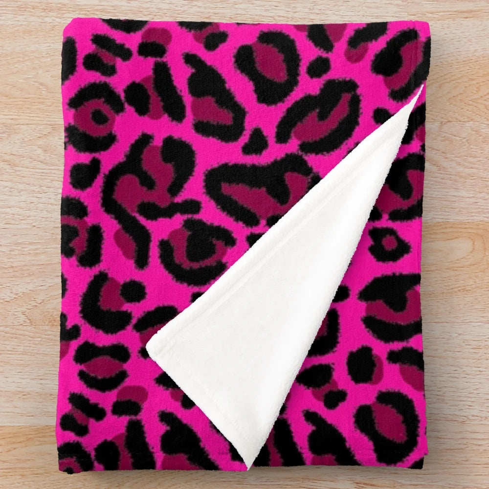 Vibrant hot pink and leopard print plush blanket