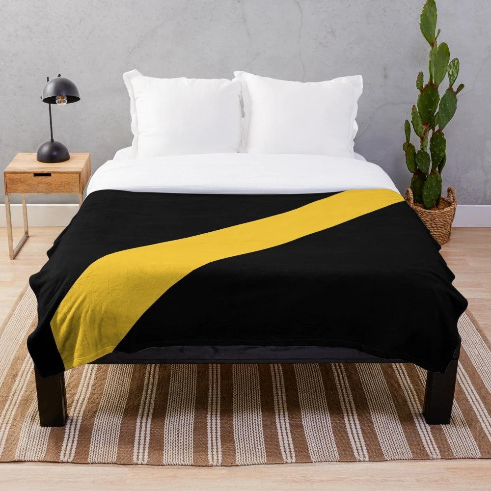 Yellow and black plush blanket for cozy home decor