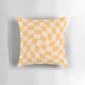 Yellow checkered pattern pillow with a vintage, retro design