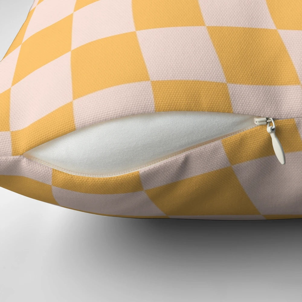 Yellow checkered pattern pillow with a vintage, retro design