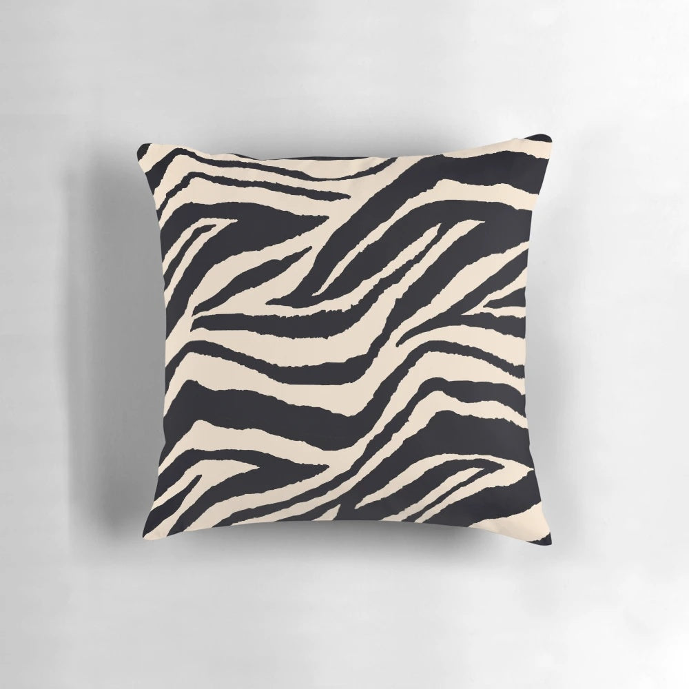 Zebra print accent pillow with a modern black and white graphic design