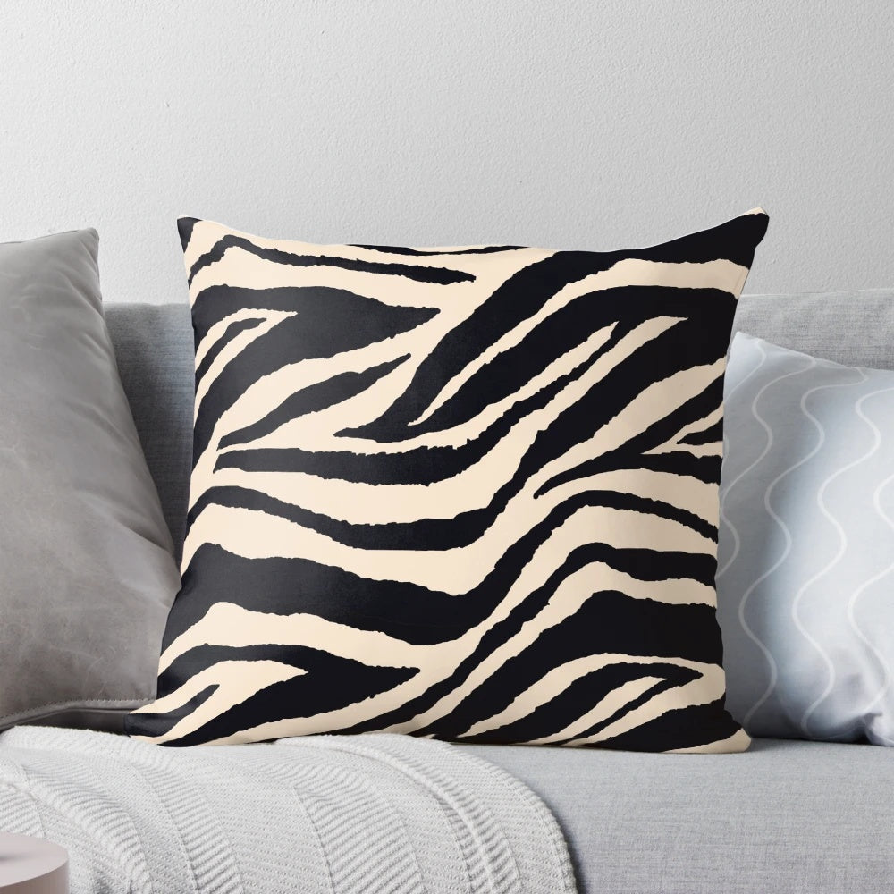 Zebra print accent pillow with a modern black and white graphic design