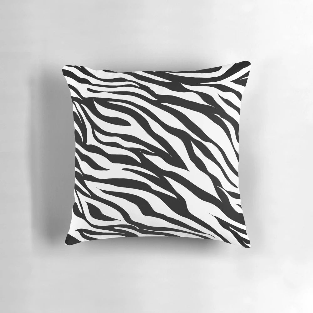 Zebra print pillow with a bold, eye-catching black and white design