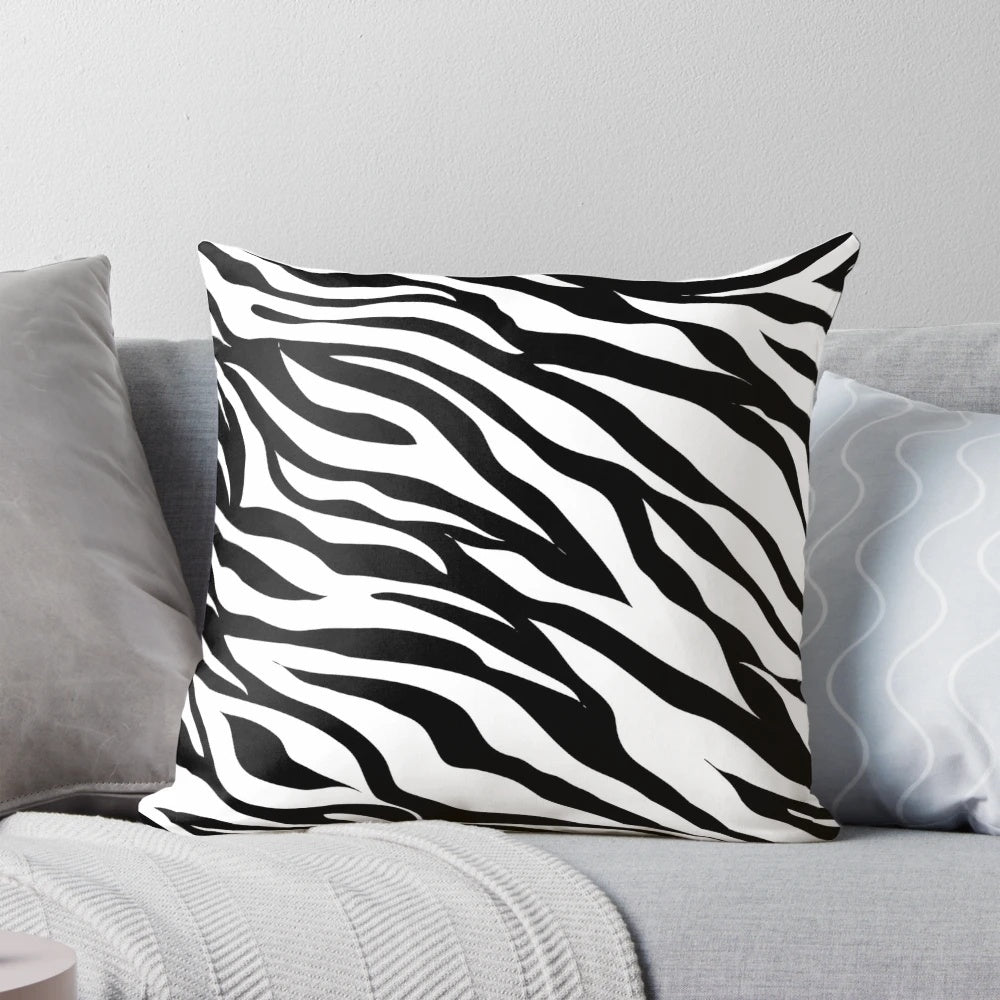Zebra print pillow with a bold, eye-catching black and white design