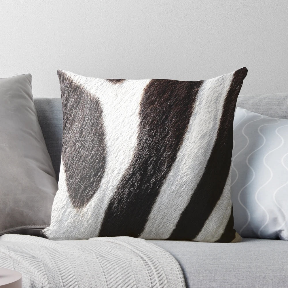 Zebra-patterned pillow in black and white