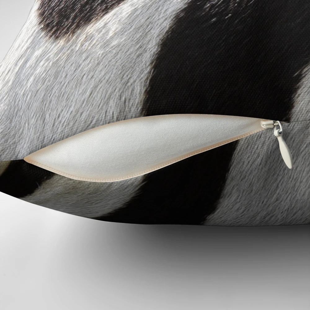 Zebra-patterned pillow in black and white