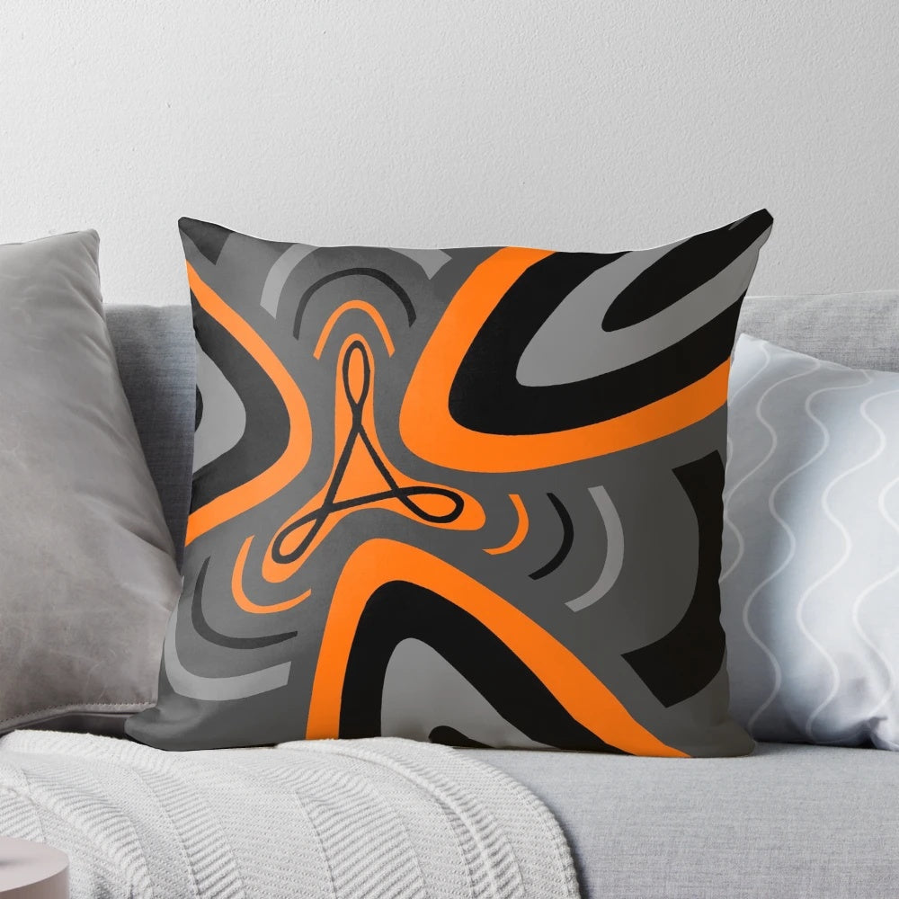 Decorative throw pillow featuring a stylized Adobe software-inspired design in orange, gray, and black