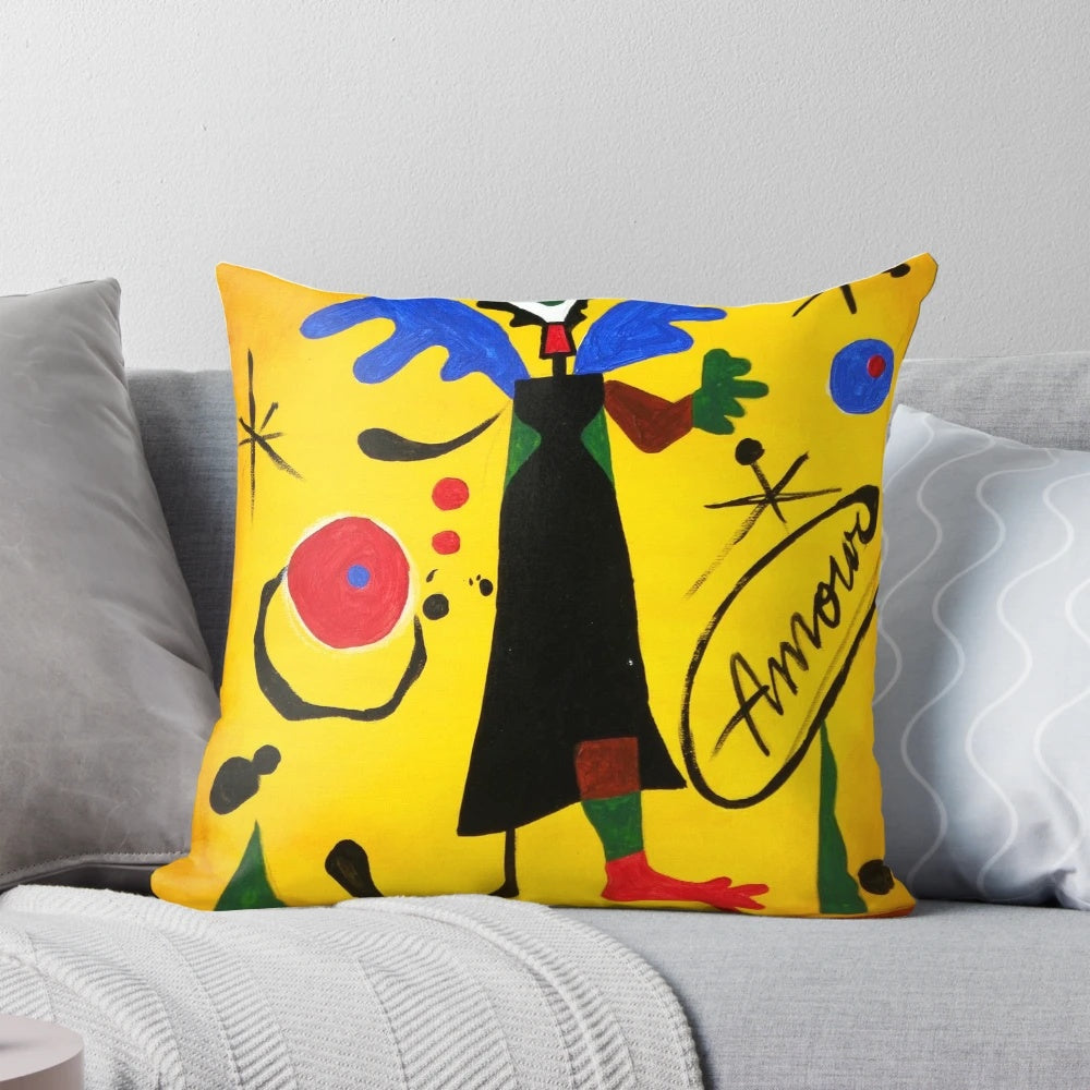 Pillow featuring a modern, abstract angel design in yellow tones