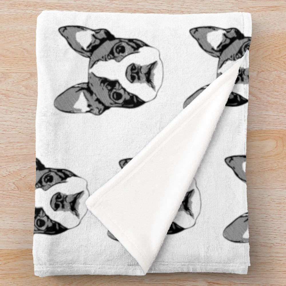 Stylized Boston Terrier dog illustration on a plush blanket