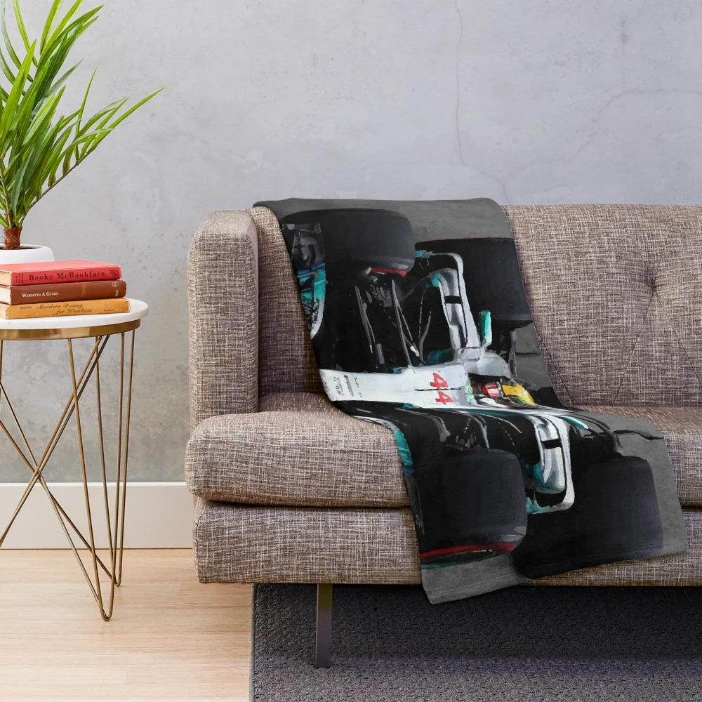 Formula 1 inspired plush blanket featuring a stylized Lewis Hamilton design