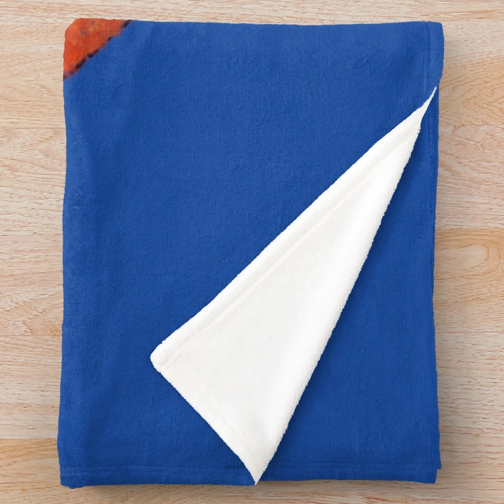 Plush blanket featuring the KU Jayhawks college basketball mascot