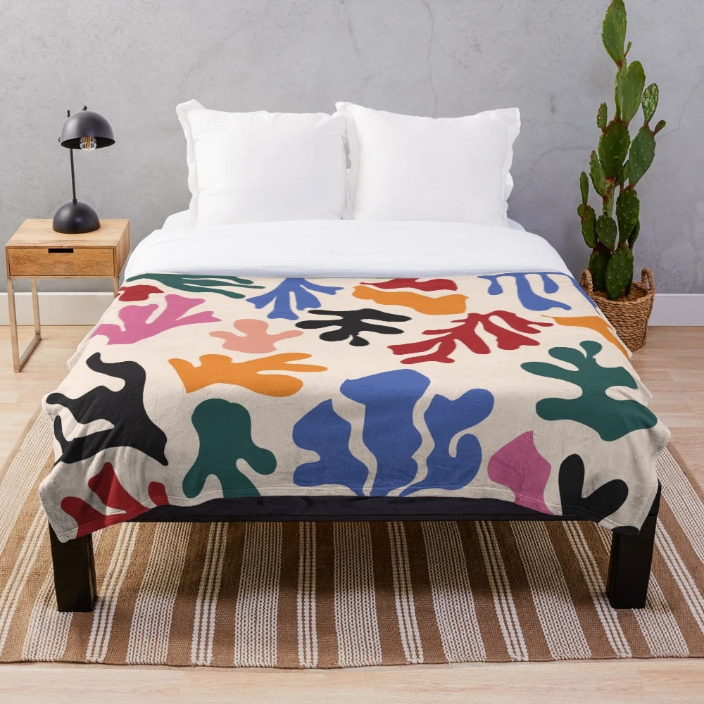Matisse-inspired plush blanket with vibrant abstract patterns